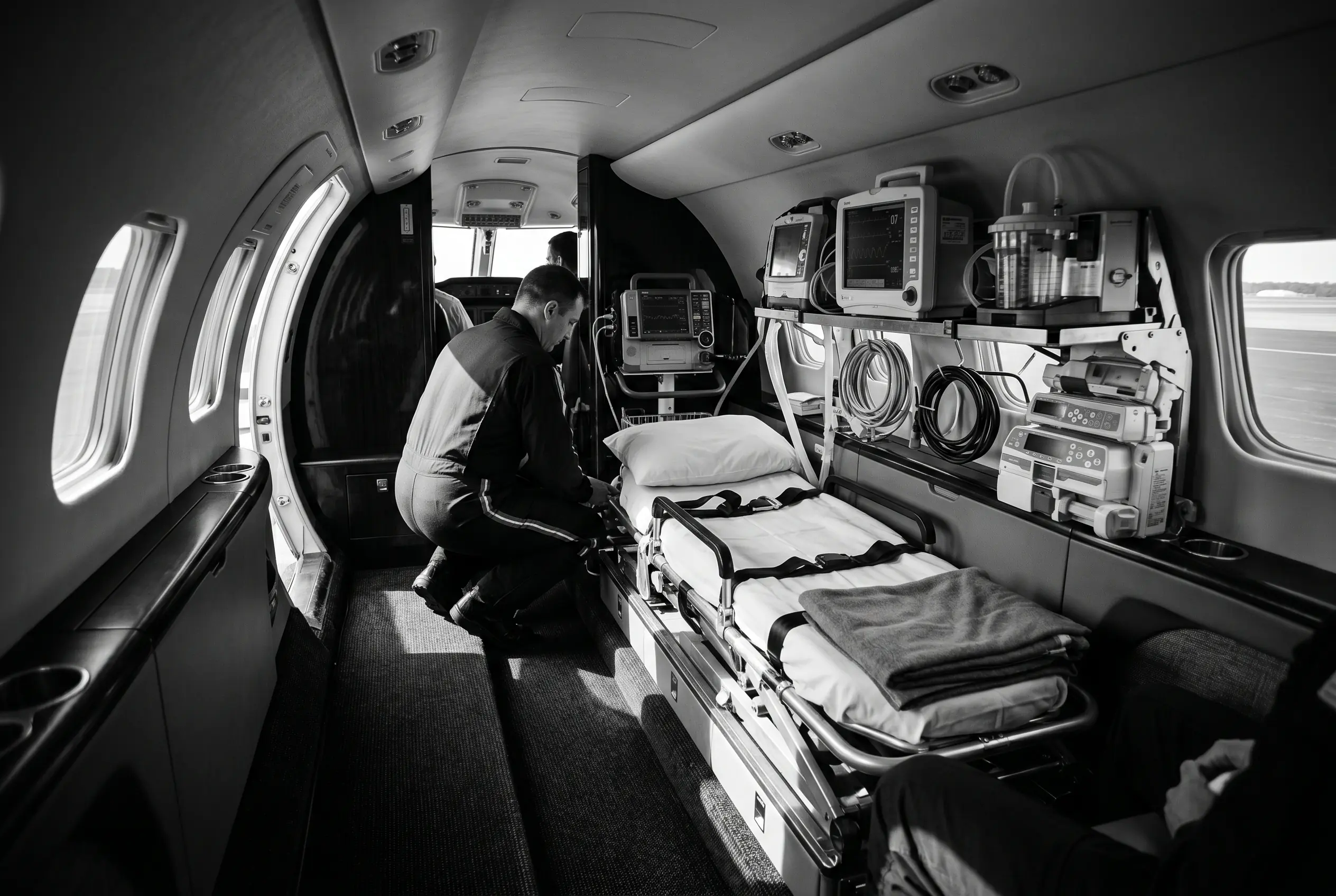 Stretcher and medical equipment installed in an air ambulance cabin for a New York to Miami transfer