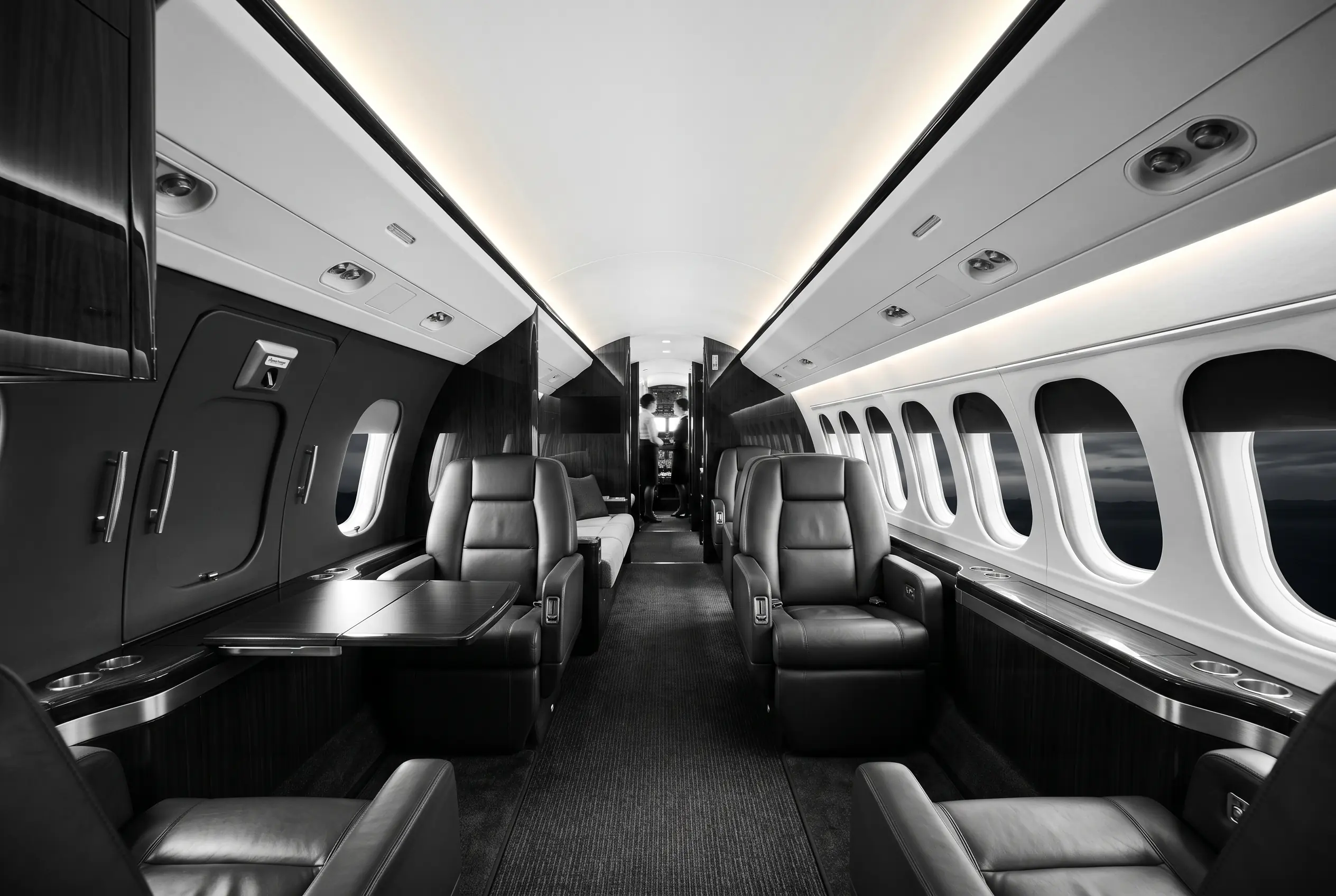 Bombardier Challenger 650 wide cabin for a New York to Miami charter, in black and white