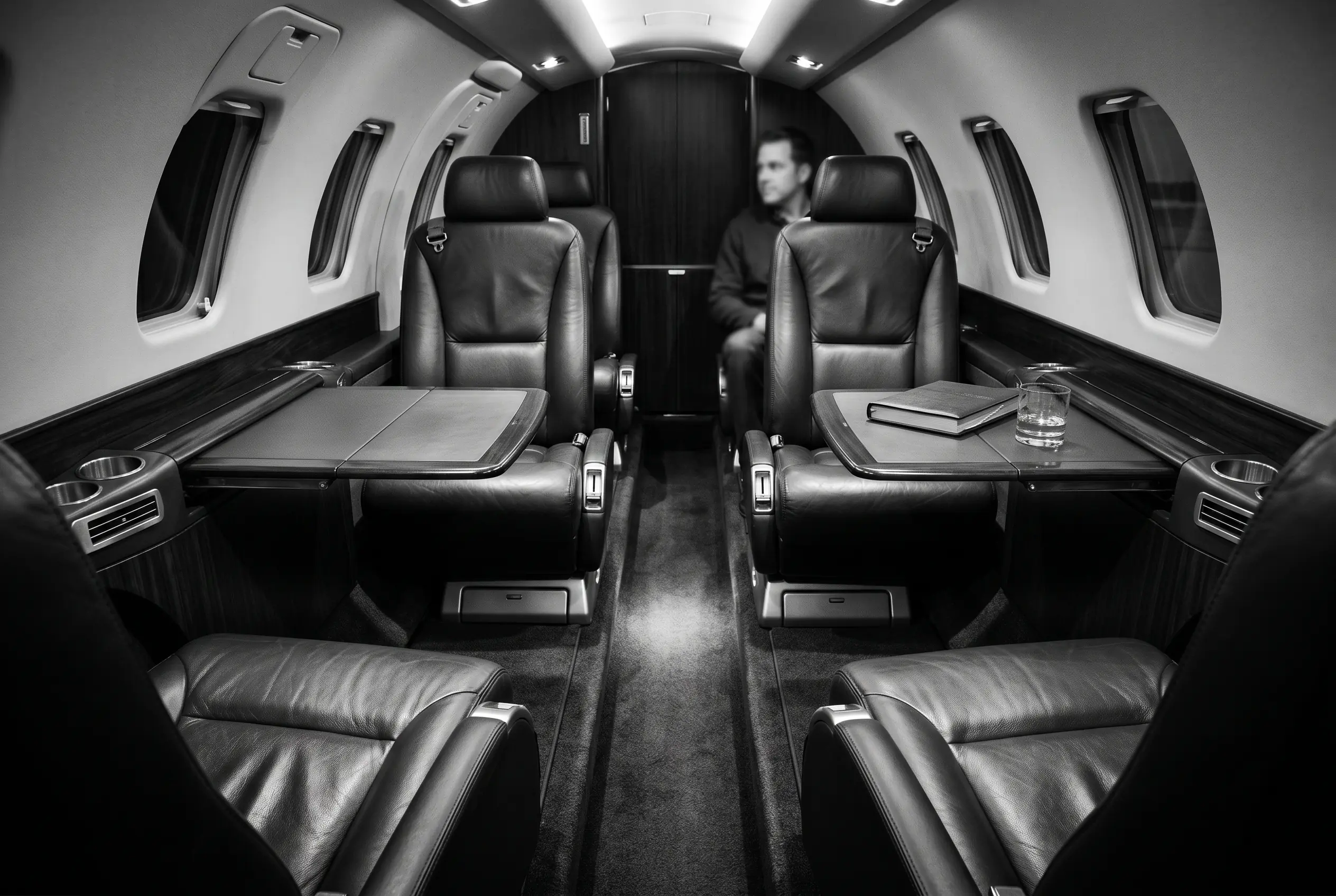 Cessna Citation CJ3+ club cabin for a New York to Miami charter, in black and white
