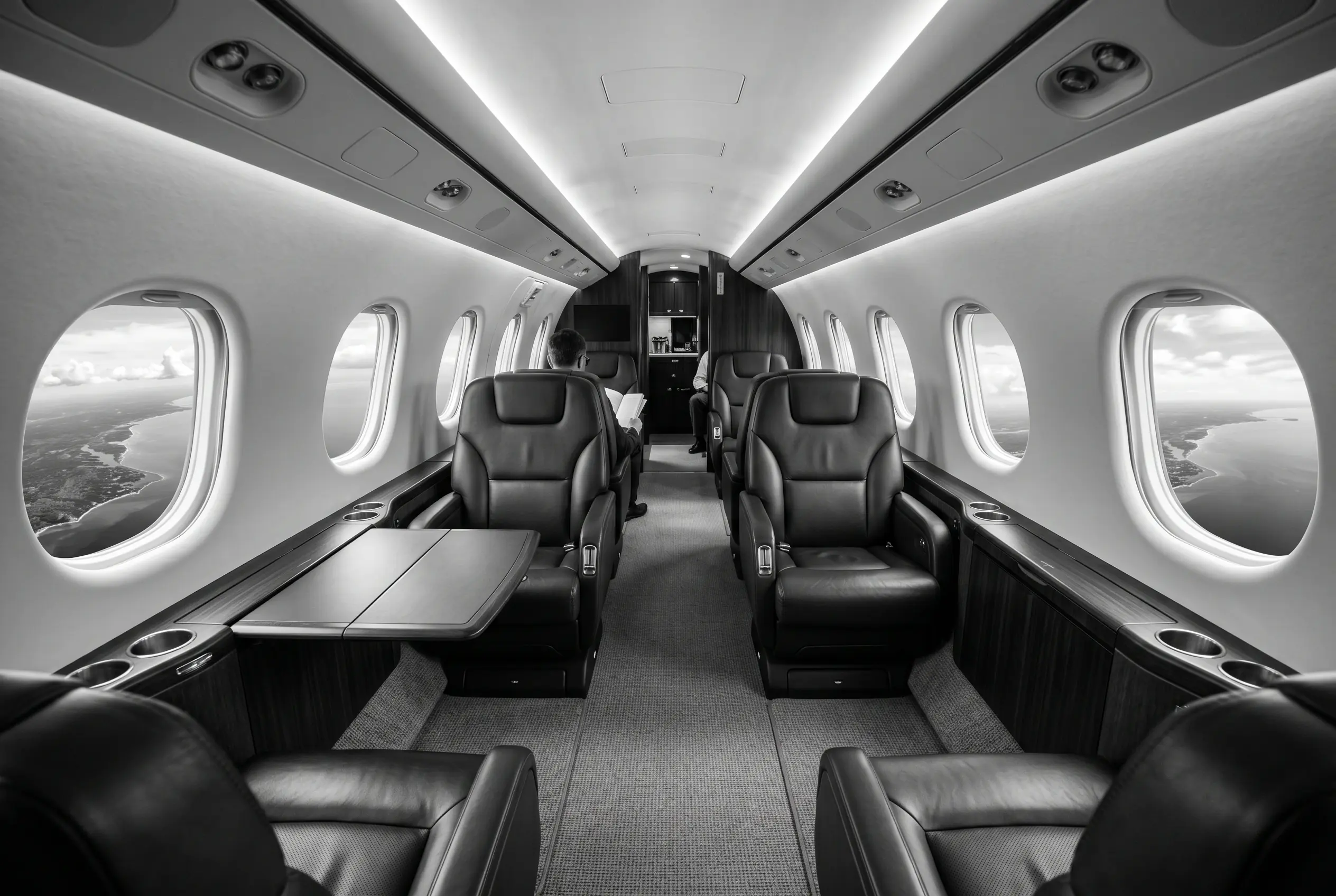 Cessna Citation Longitude walk-in flat-floor cabin for a New York to Miami charter, in black and white