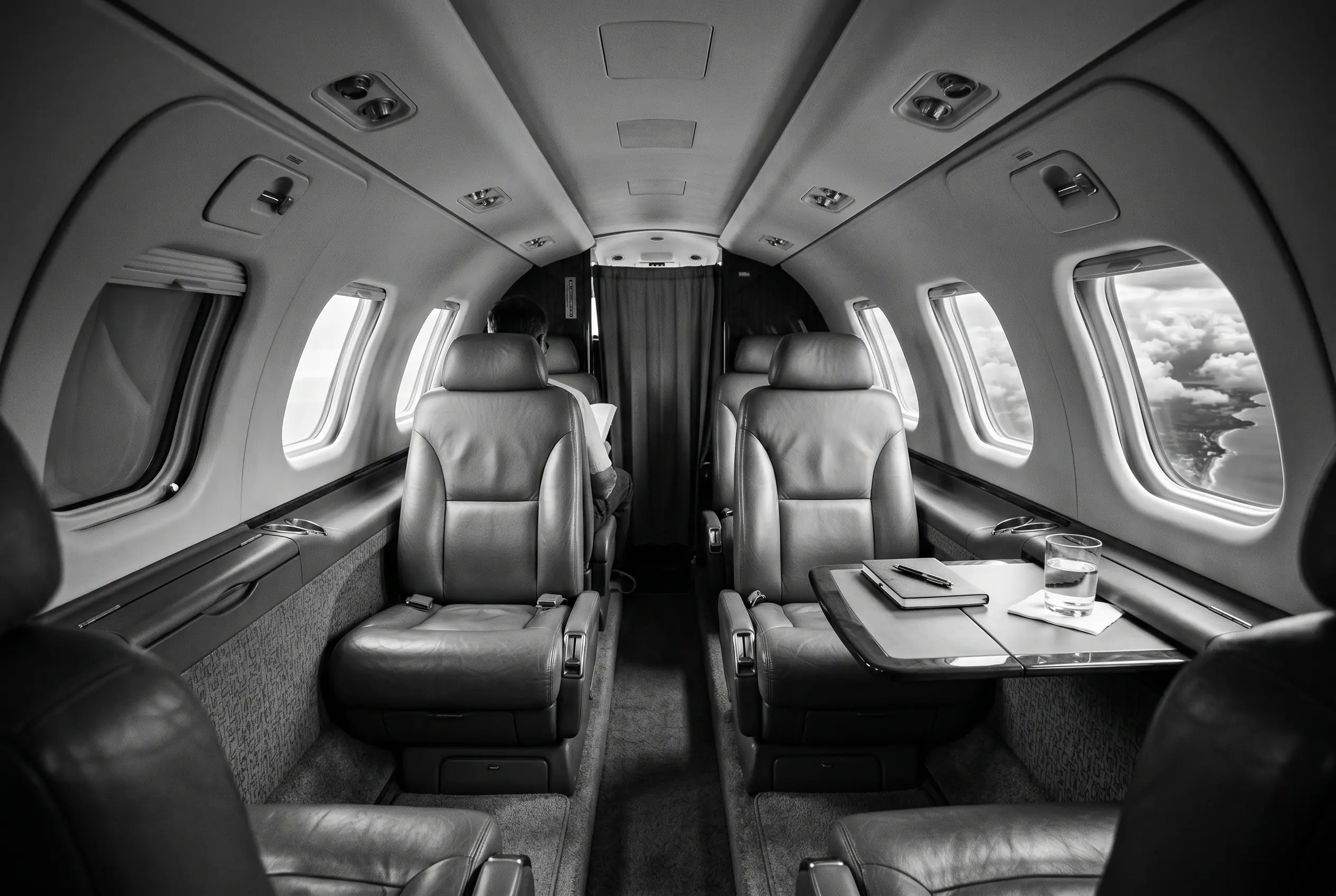 Cessna Citation Mustang cabin for a New York to Miami charter, in monochrome