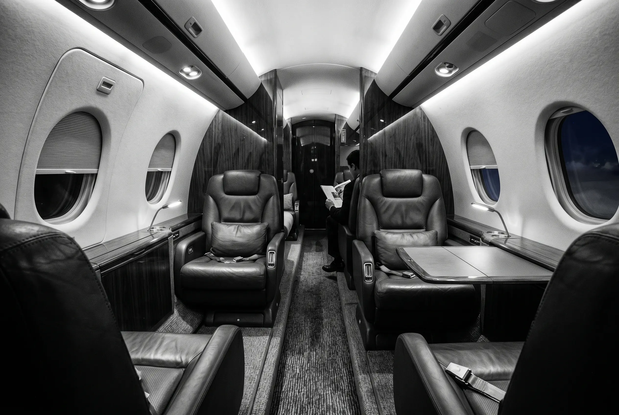 Cessna Citation X cabin for a New York to Miami charter, in black and white
