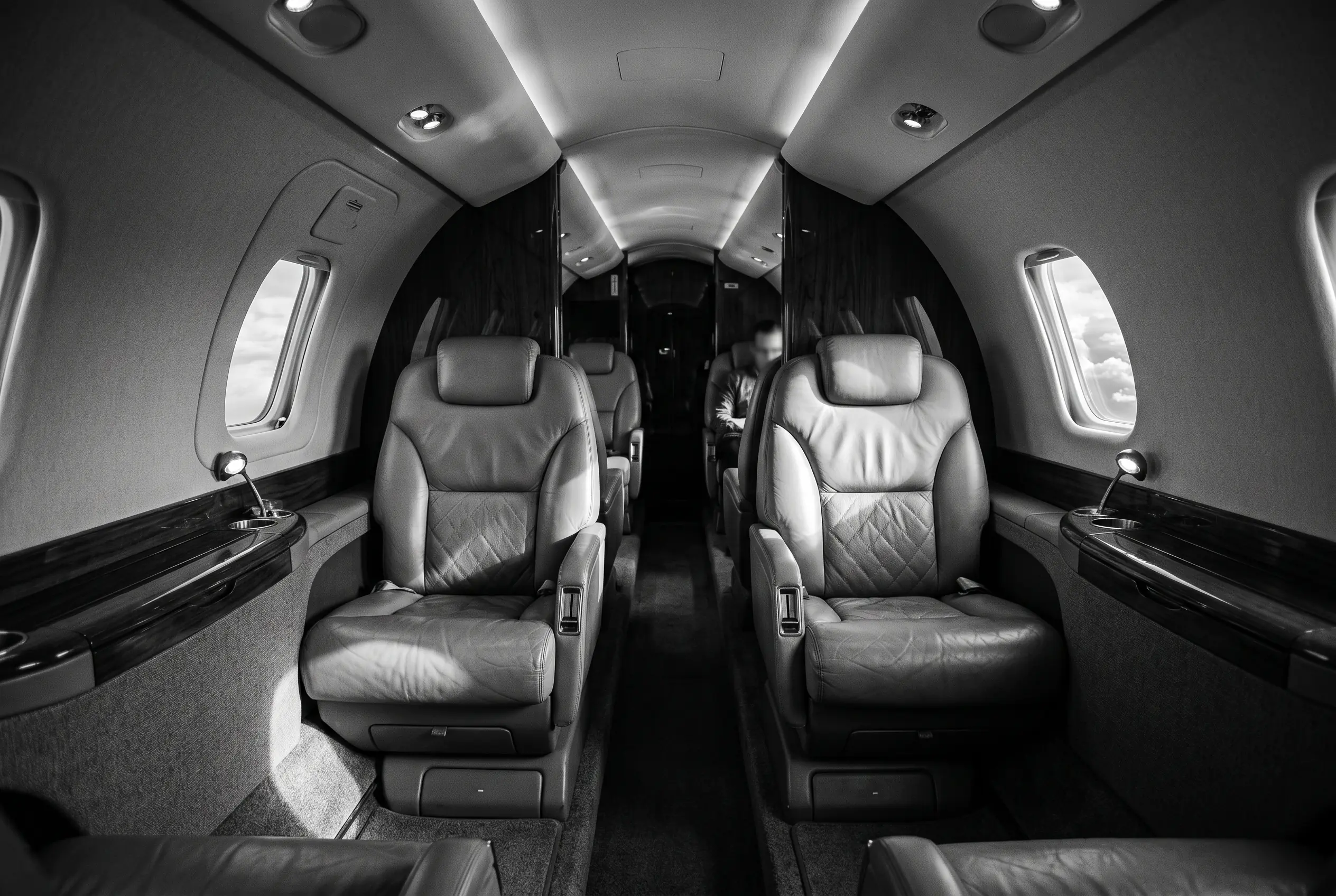 Cessna Citation X+ cabin for a New York to Miami charter, in monochrome