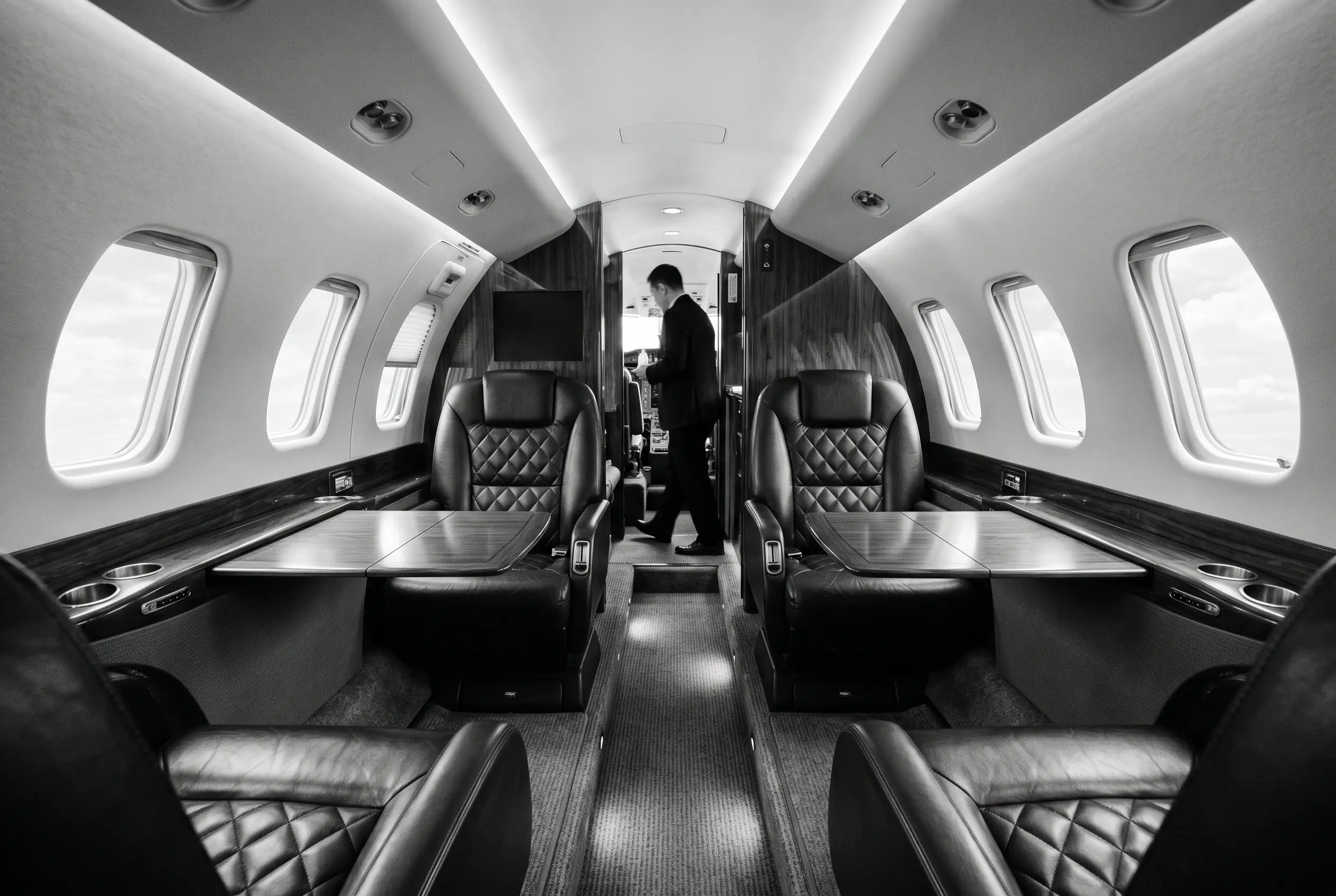 Cessna Citation XLS+ stand-up cabin for a New York to Miami charter, in monochrome