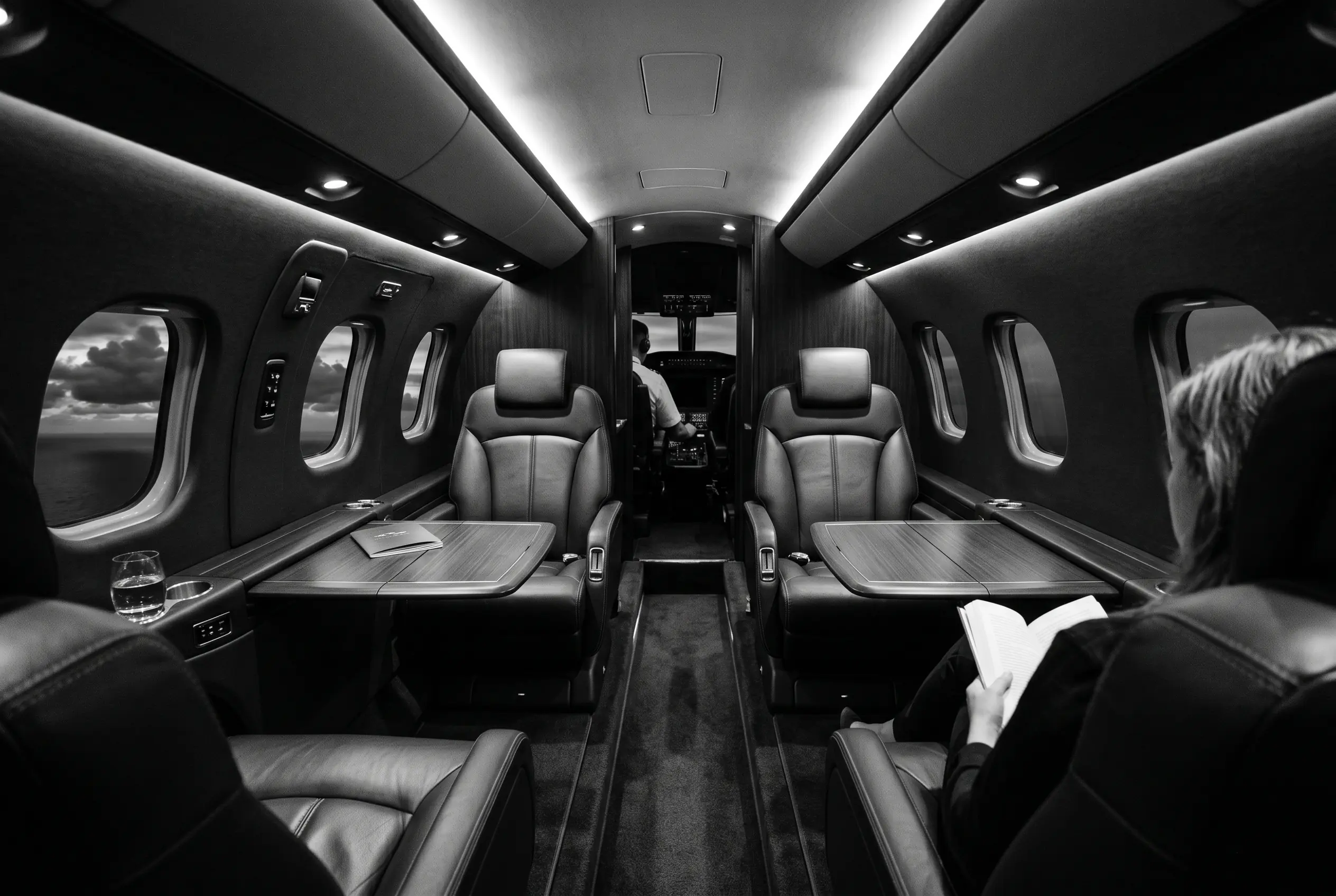 Epic E1000 GX cabin for a New York to Miami charter, in black and white