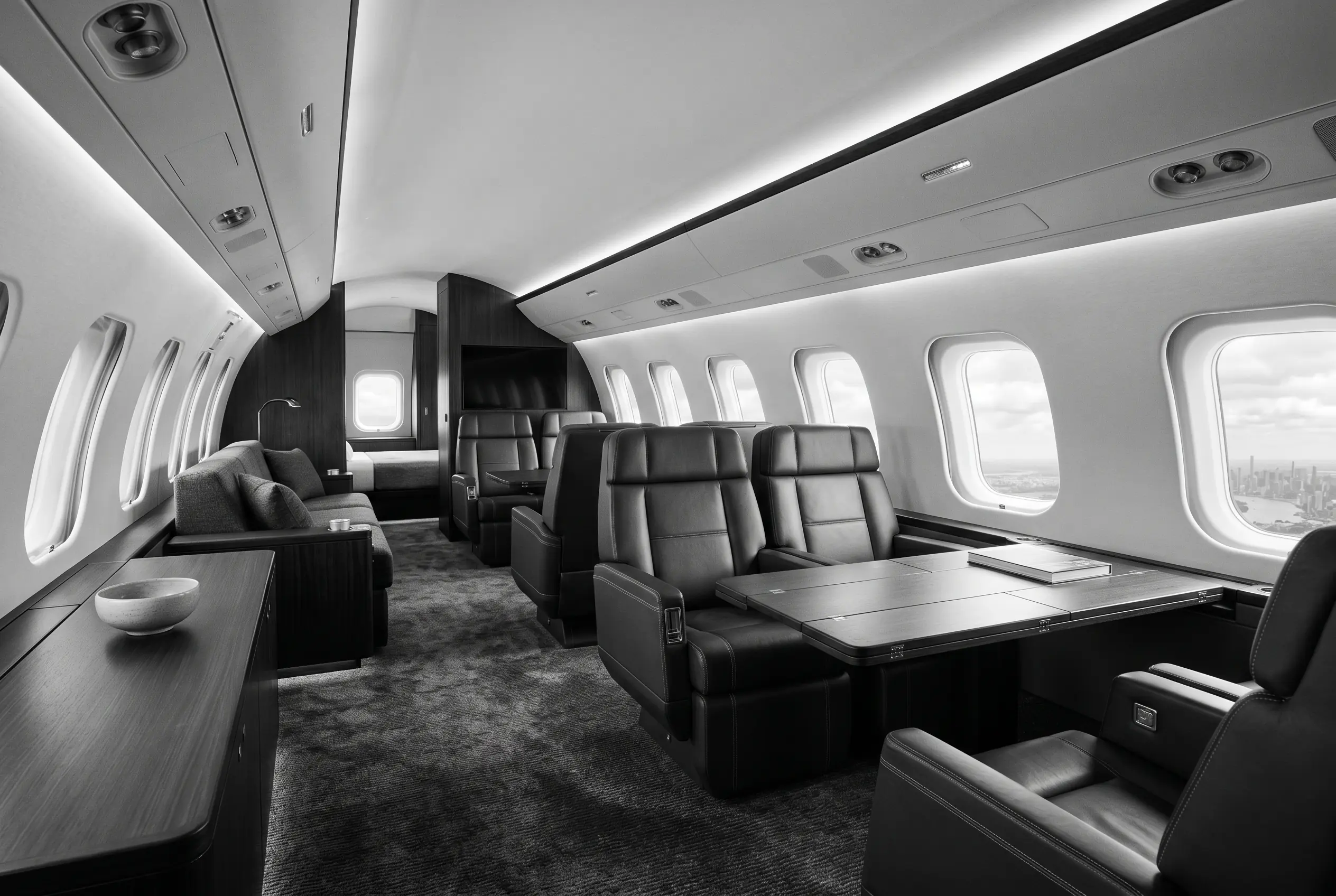 Bombardier Global 7500 four-zone cabin for a New York to Miami charter, in black and white
