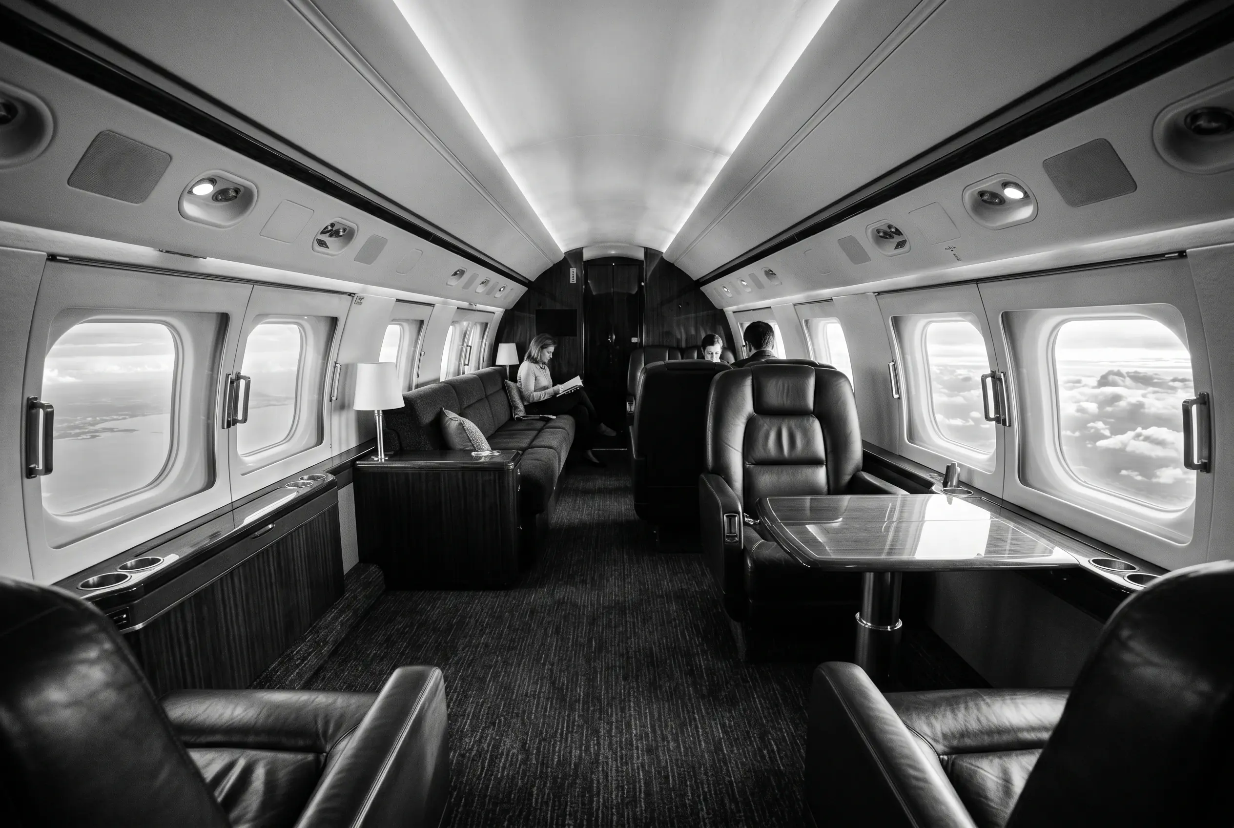 Gulfstream G550 large cabin for a New York to Miami charter, in monochrome