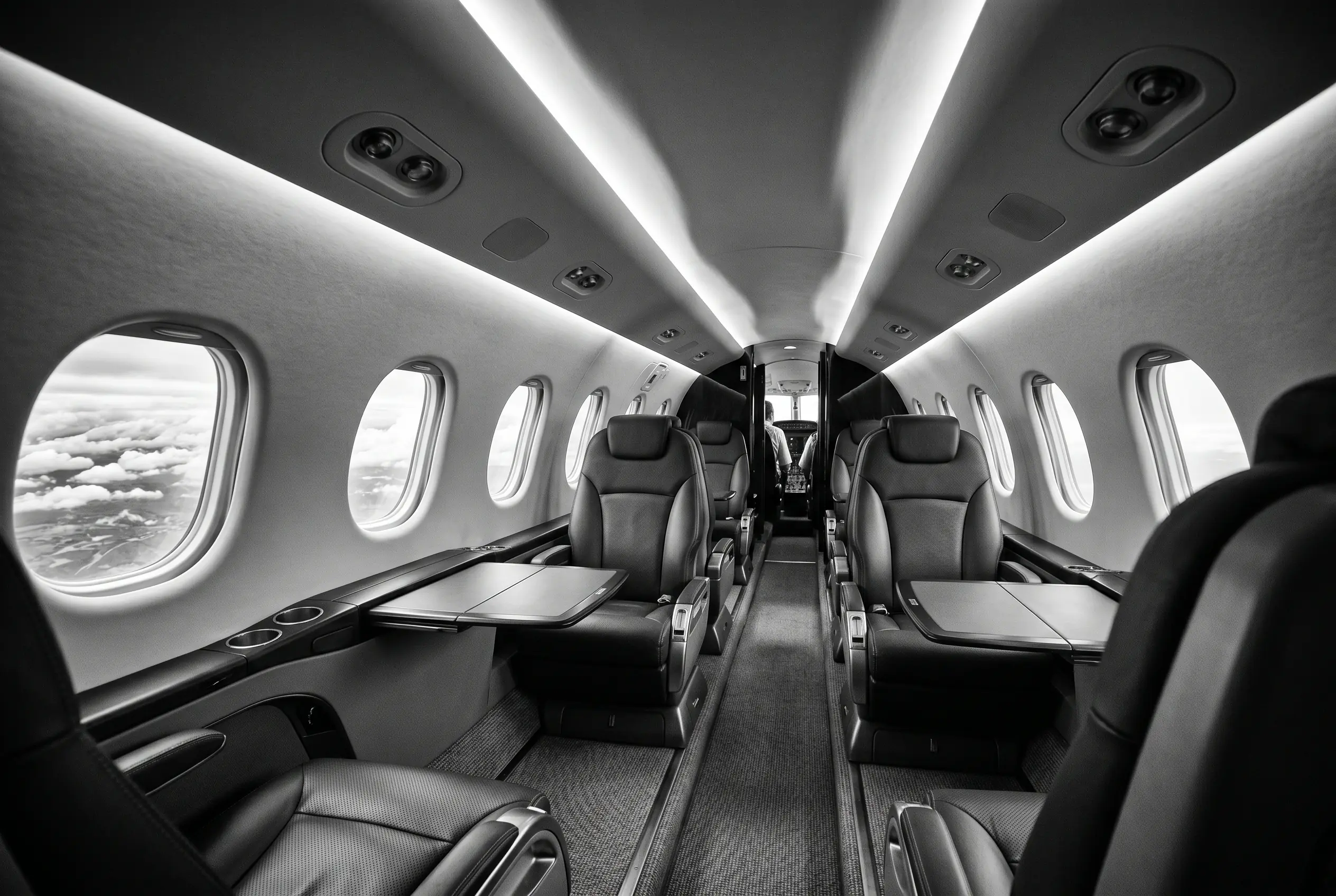 Piaggio Avanti EVO stand-up cabin for a New York to Miami charter, in monochrome