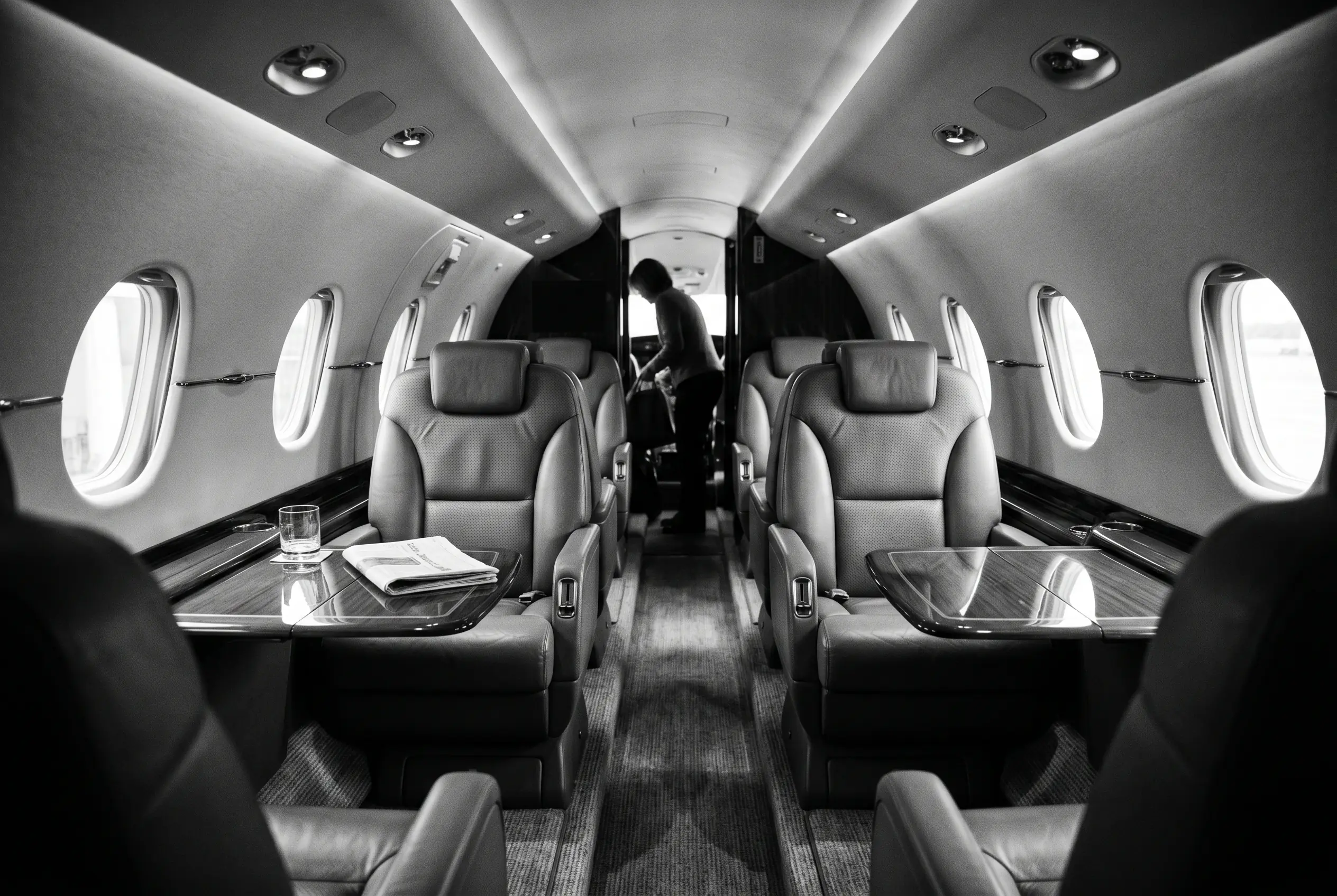 Pilatus PC-12 executive cabin for a New York to Miami charter, in black and white